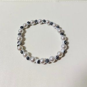 Evileye black and white beaded bracelet made by EvileyebyMaria.